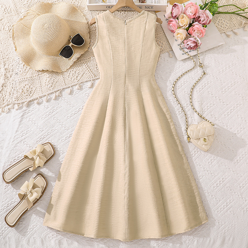 Elegancka sukienka dziewczęca bez rękawów na wiosnę i lato_voghion.com