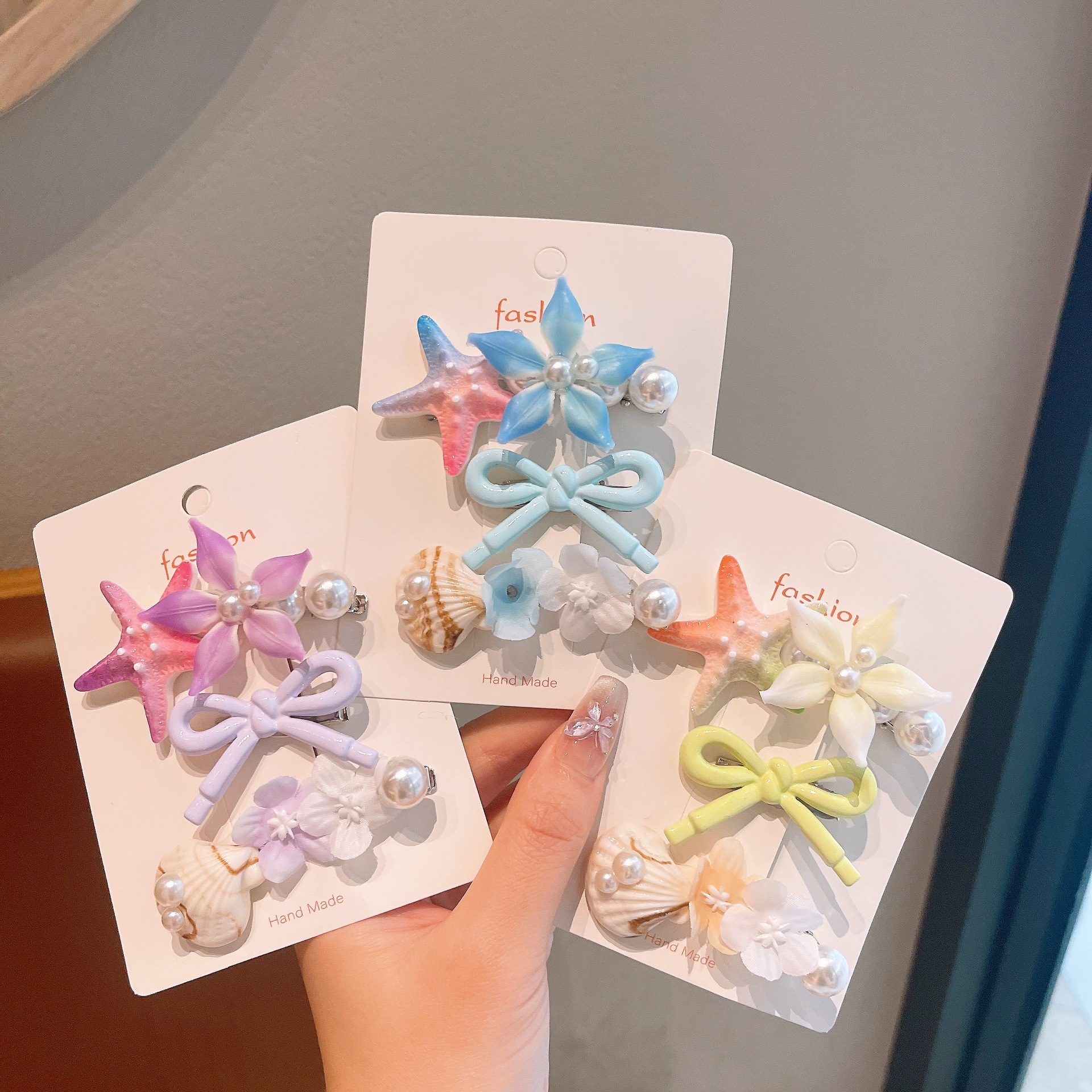 Nuevo adorable adornamiento para el cabello de niños estrella de mar conchas de perlas clips para el cabello de mujeres gradiente estereoscópico flores pequeñas toque de cabeza para niños