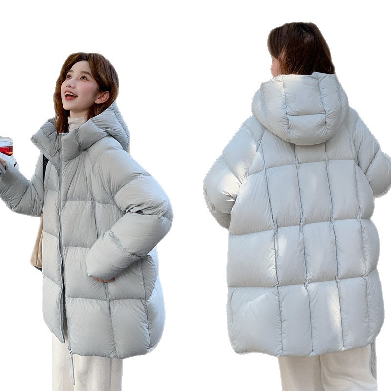 2025 invierno de algodón largo y medio nuevo suelto engrosado chaqueta de algodón con capuchón caliente fábrica directa