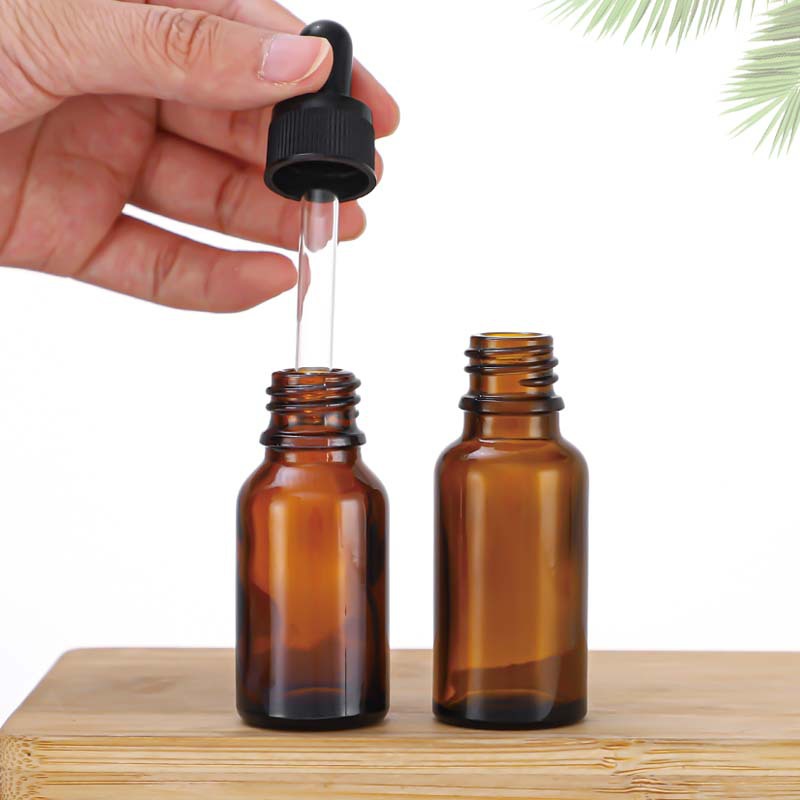En stock: botella de aceite esencial marrón de 30 ml, botella dispensadora de vidrio de 10 ml, botella con gotero marrón de 50 ml, botella de vidrio de 20 ml.