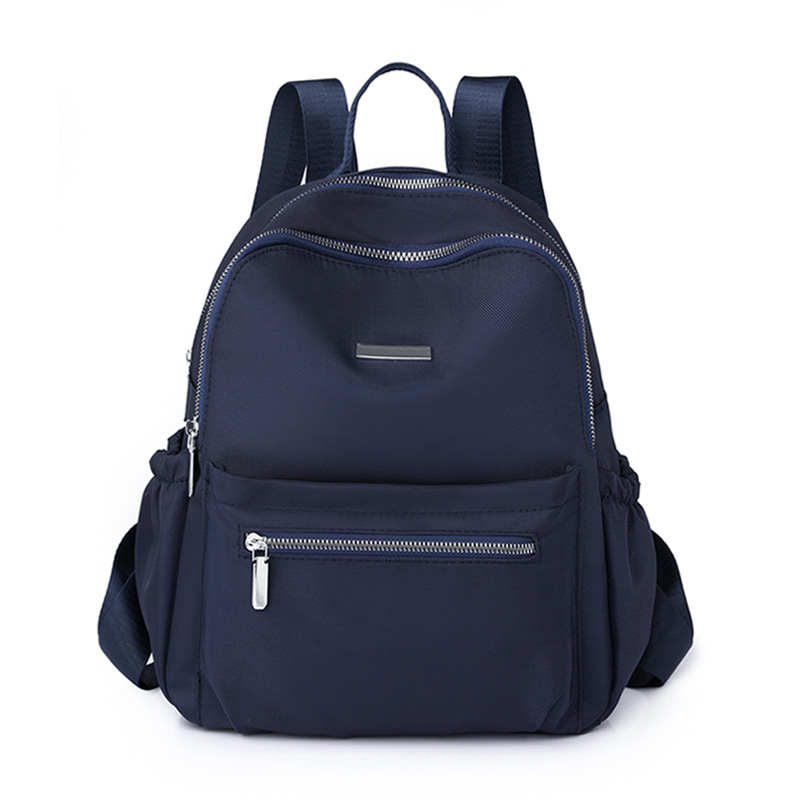 2023 otoño nuevo estilo casual damas mochila de nailon simple color sólido al aire libre mochila de viaje ligera mochila escolar