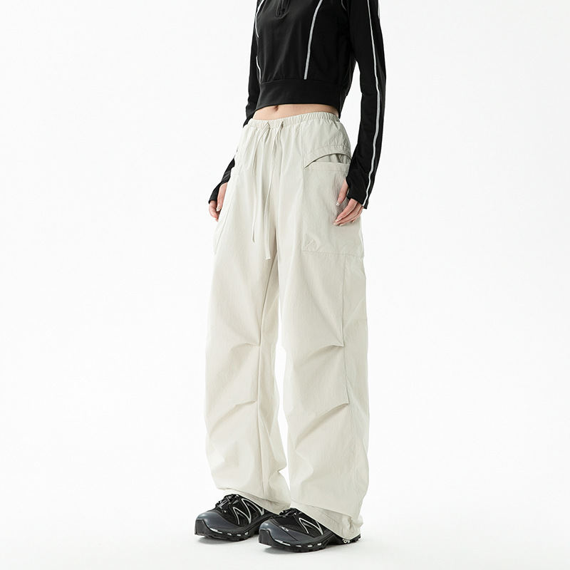 Pantalones de montaña al aire libre de mujeres de montaña trekking pantalones deportivos de secado rápido paracaidistas primavera y otoño pantalones largos de dopamina