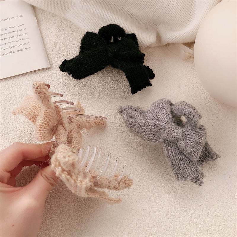 Otoño y invierno nuevo arco lana de punto pinzas de cabello de alta sensación otoño y invierno tocado de Año Nuevo rascar pinzas de pescado para mujeres