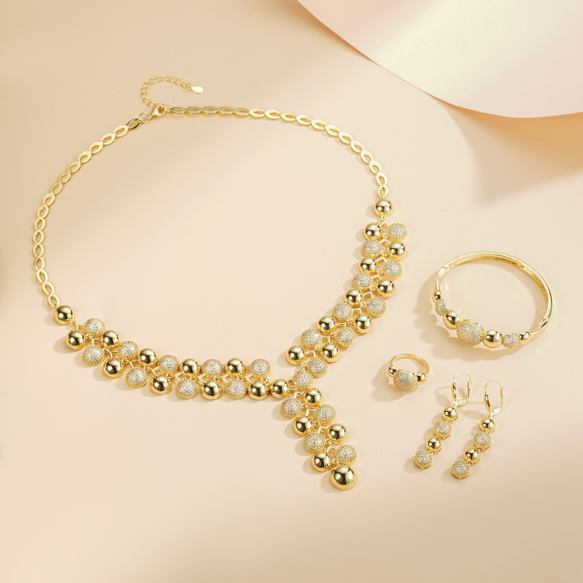 Diseño de moda de alta gama, cuentas de diamante, collares, pendientes, pulseras, anillos, 14K, cuatro piezas, conjunto de bronce