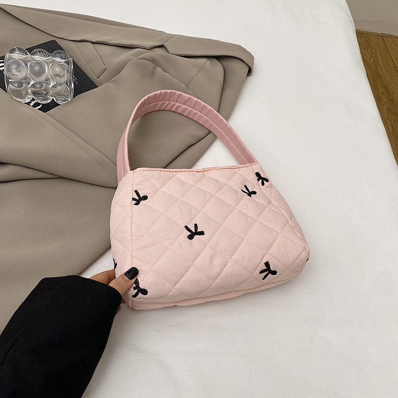 2024 nuevo bolso de arco de bordado, bolsa de maquillaje de gran capacidad, bolsa de lavado, bolsa de ocio, bolsa de mujer