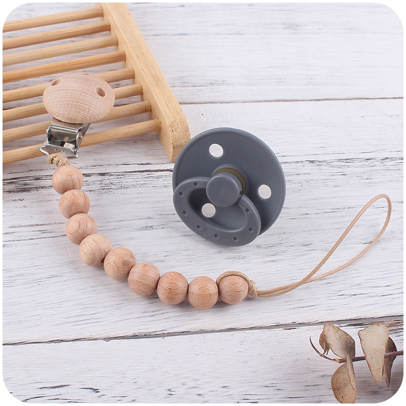 Nuevos suministros para bebés Beech chupete cadena calmante bebé redondo de silicona chupete mordedura molar traje de dos piezas