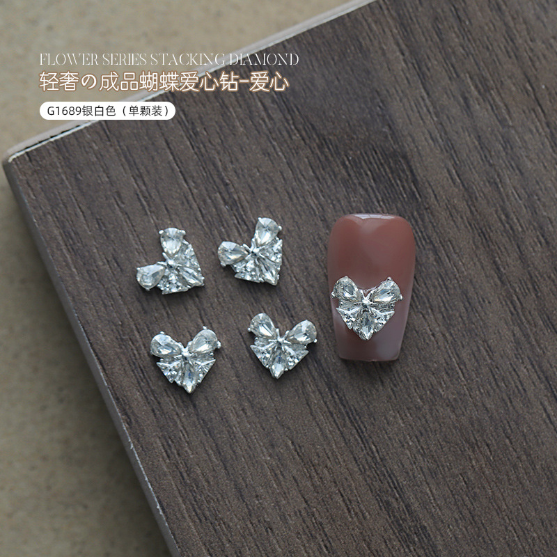 Love bowknot aleación manicura pila de diamantes productos terminados celebridades de Internet nuevas decoraciones de uñas de diamantes de pila súper flash al por mayor