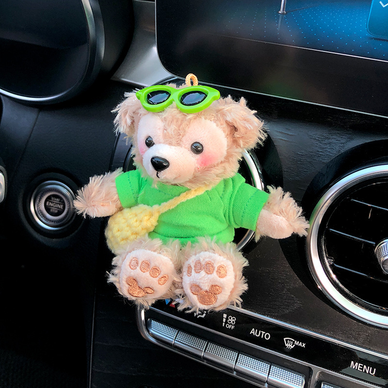 2025 nuevo coche muñeca oso de felpa Tamiflu coche aromaterapia de salida de aire decoración interior accesorios de coche decoración mujer