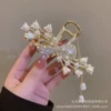With bow
