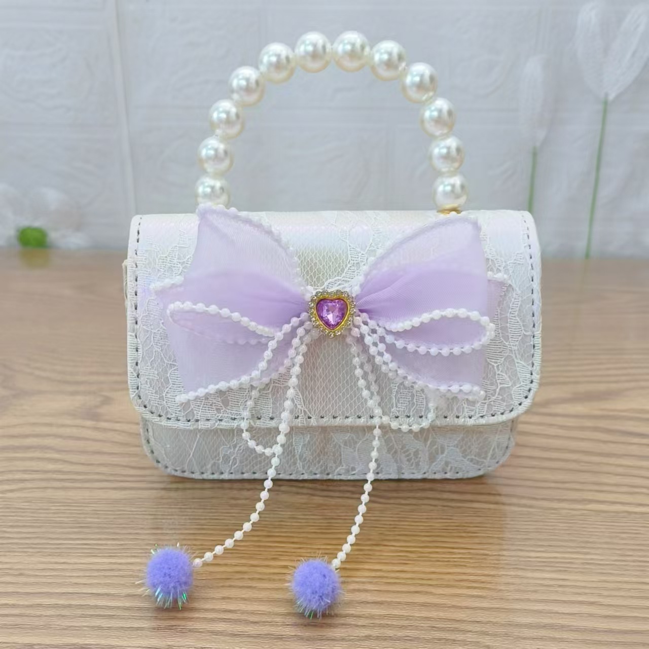 Bolsa de arco princesa bolso de perlas bolso de mano cadena bolso de cinturón pequeño viento bolso de niñas bolso de regalo del día de los niños bolso pequeño