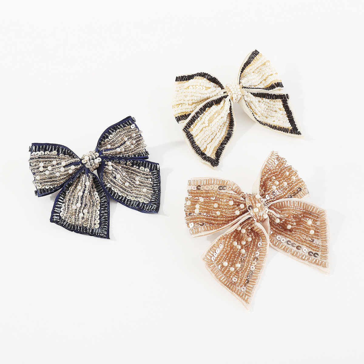 Sweet Commute Bow Knot Cloth Seed Bead Sequins Hair Clip display picture 1