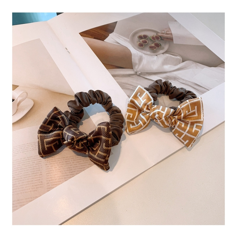 Korea Retro Printed Cute Little Bowknot Hair Scrunchies display picture 5