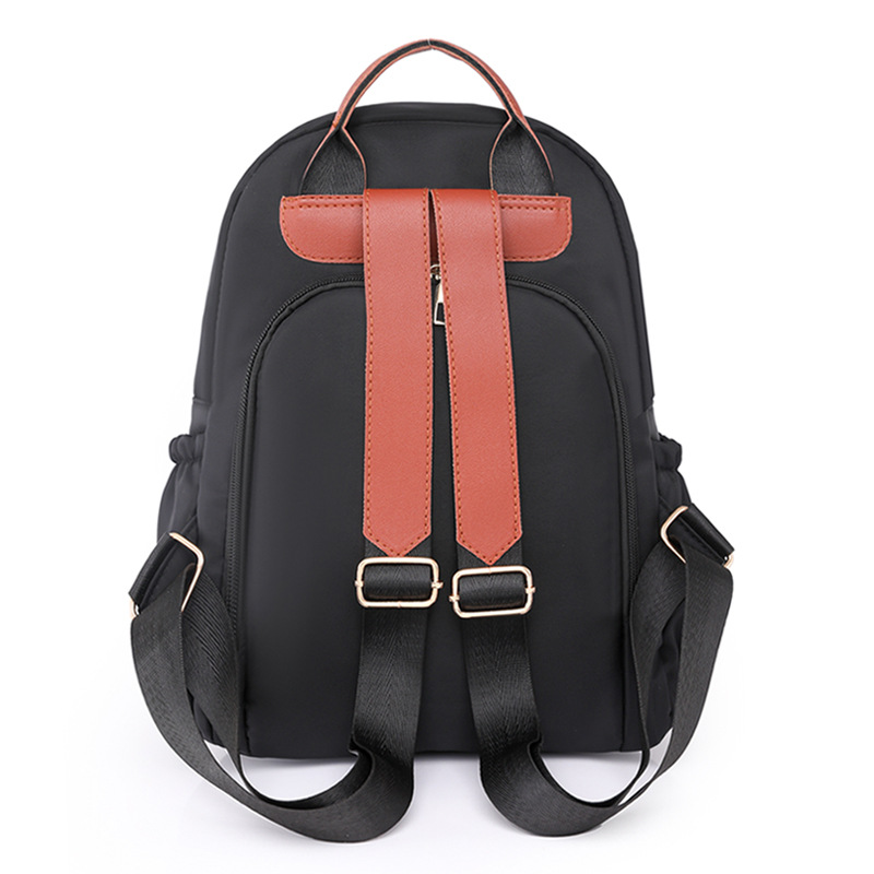 2023 nueva mochila casual para mujer de nailon moda salvaje viaje urbano mochila pequeña mochila escolar ligera al por mayor