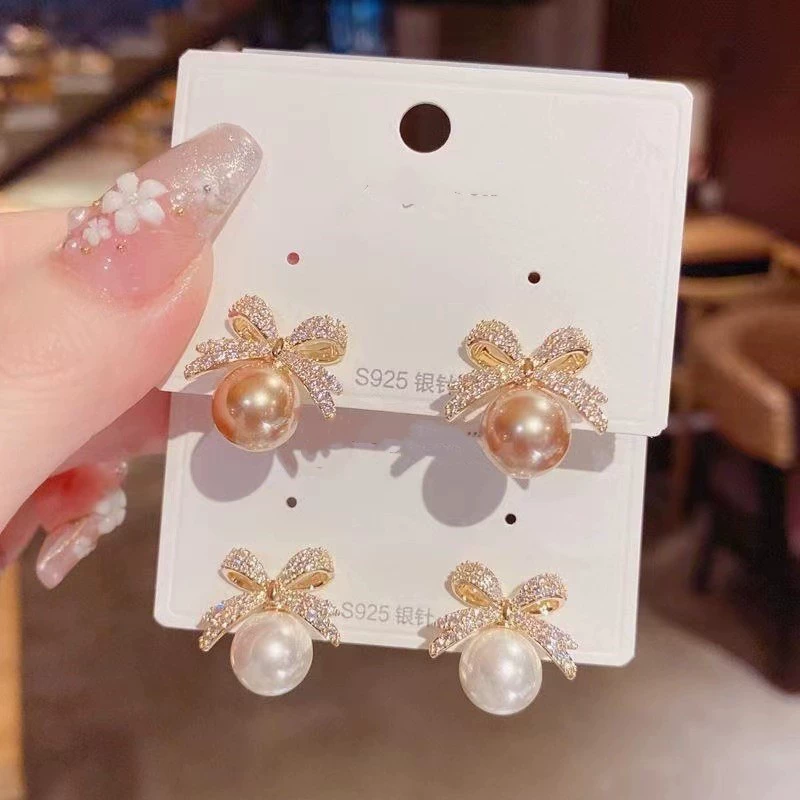 Sophisticated cute fashionable small earrings with bow from pearl, Japanese and Korean, diamond encrusted, simple and elegant design, wholesale