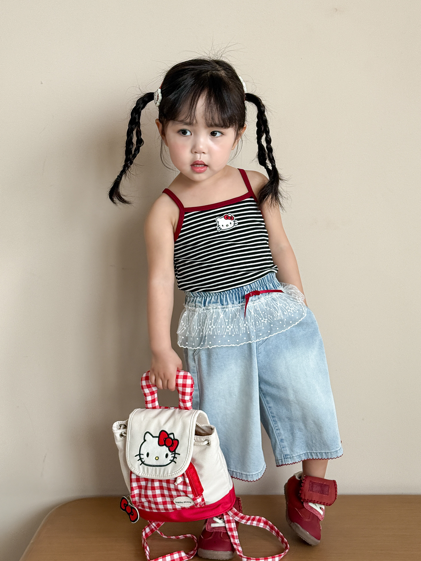 Caña de pera ropa para niños camisola para niñas estilo fino de verano 2025 nuevos tops a rayas de dibujos animados para niños ropa de bebé para niñas