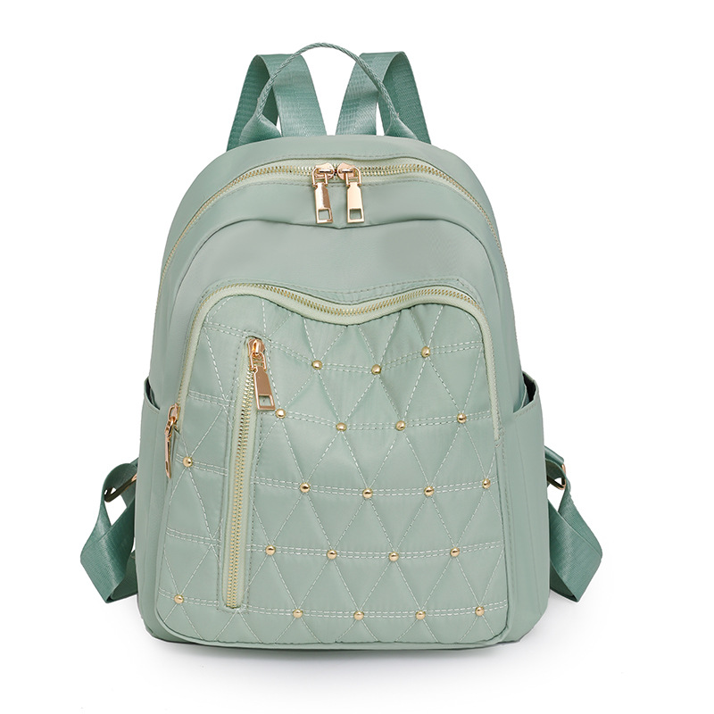 Mochila de nailon bordada de rombo para mujer 2024 nuevo estilo casual para mujer mochila de viaje ligero para viajeros urbanos