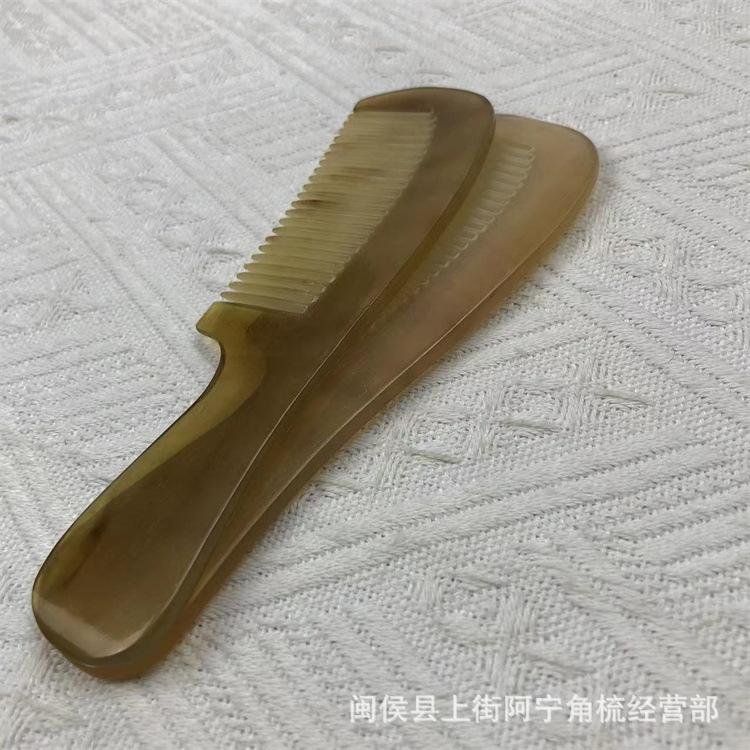 Horn Comb 15cm Handle Comb with Round Teeth and Gua Sha Tool for Hair Care in use
