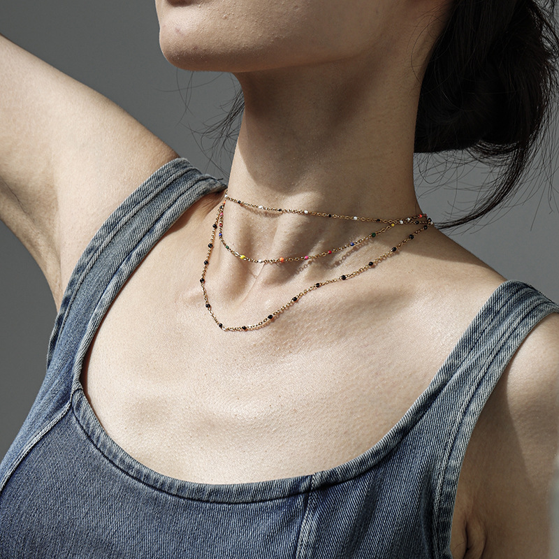 Collar de acero de titanio colorido de goteo de aceite europeo y americano de la moda de primavera y verano con collar de acero inoxidable para mujeres