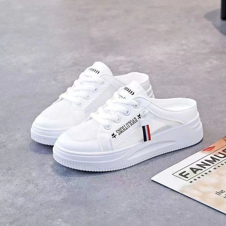 Baotou medio zapatillas de verano para mujeres 2025 nuevos zapatos de mujer perezosos con un pedazo antideslizante cómodos zapatos de lona para mujeres