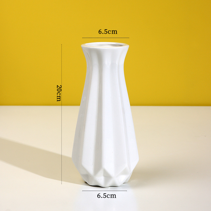 シンプルな現代の満天星陶磁器の花瓶の置物の客間の白い磁器の小さい清新な乾いた花の生け花の創意の陶磁器の花器|undefined
