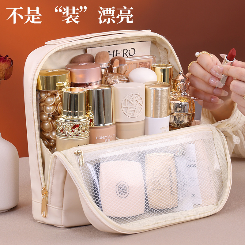 Nuevos productos transfronterizos de absorción magnética tridimensional bolsa de maquillaje de viaje portátil de gran capacidad de pie bolsa de almacenamiento de cosméticos bolsa de lavado