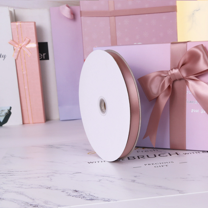 Un solo lado de poliéster cifrado cinta de boda festiva embalaje cinta accesorios de ropa 161 lotus polvo cinta de color fábrica al por mayor