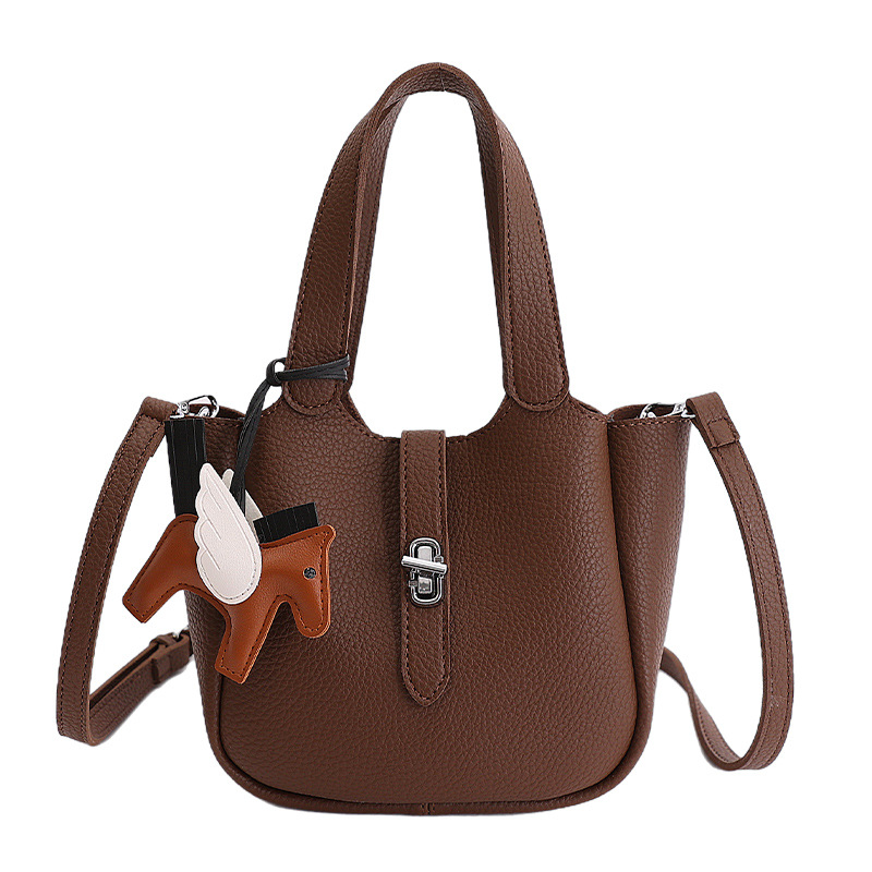 Bolso para mujeres 2026 venta caliente nuevo nicho coreano bolso de cubo portátil de textura alta moda lujosa bolsa de mochila