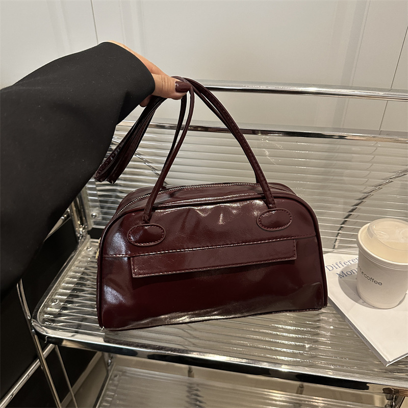 Bolso de bolos portátil con cremallera de múltiples bolsillos de gran capacidad de diseño de nicho para mujer 2025 nuevo bolso de hombro de cercanías para axila