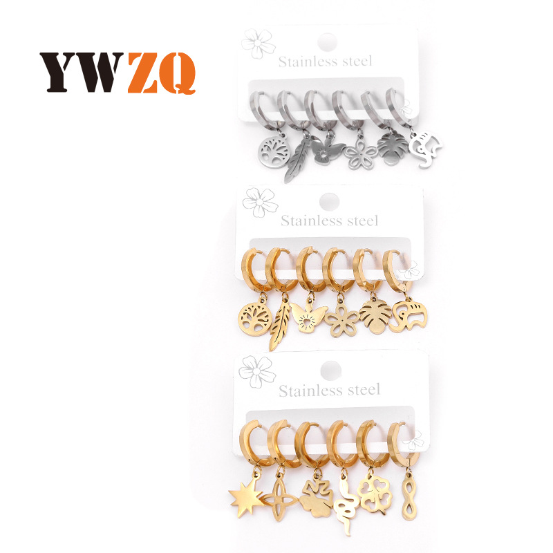 Joyería de acero inoxidable transfronterizo corte hueco flor planta Awn estrella patrón geométrico oreja dorada hebilla traje fabricante