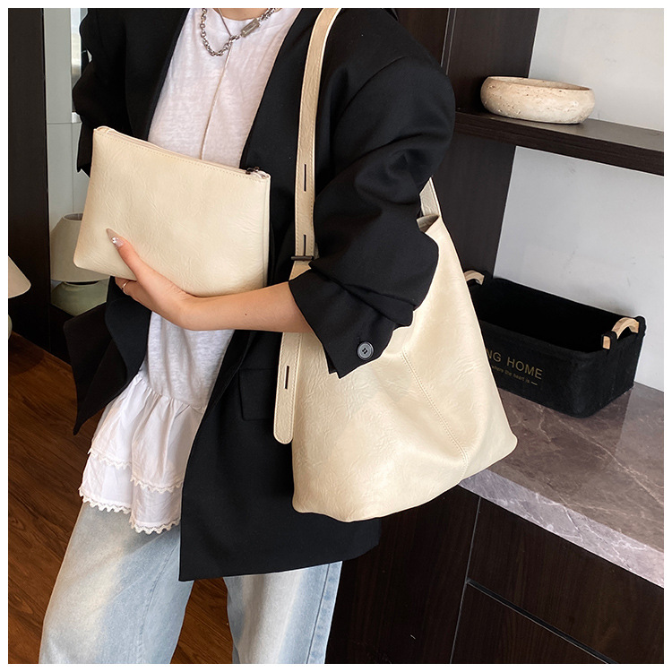 Korean style, retro, large-capacity tote bag for women, new summer 2025, versatile, fashionable, simple and solid color crossbody bag undefined