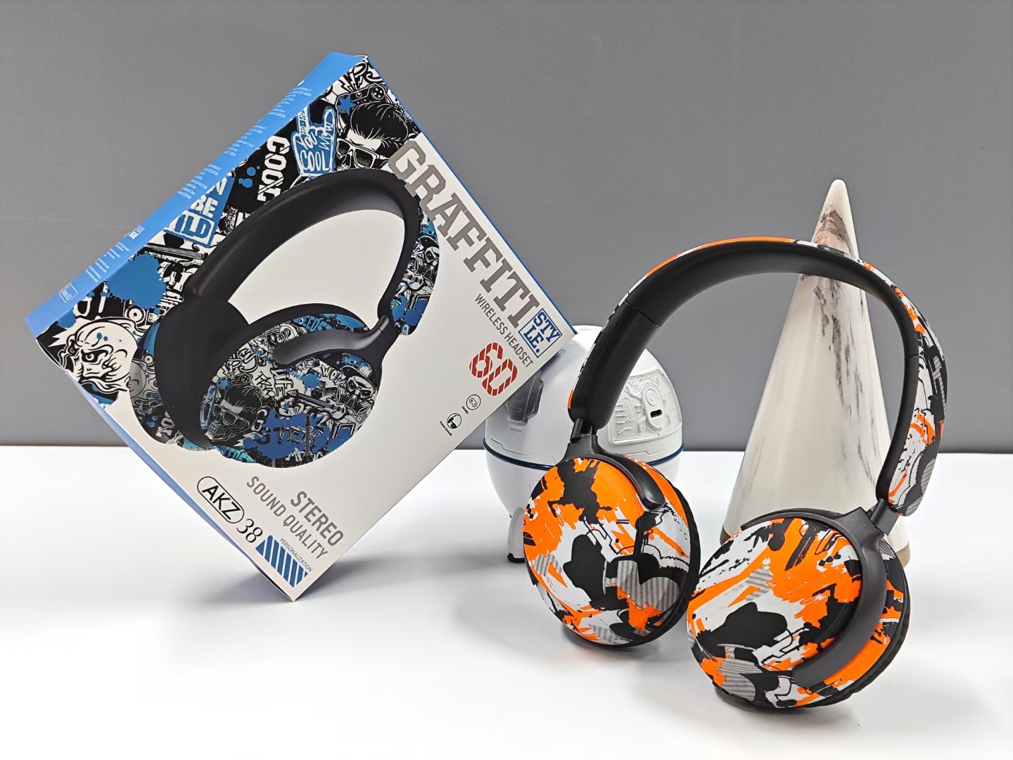 Transfronterizos nuevos AKZ - 38 personalidad creativa camuflado graffiti auriculares auriculares Bluetooth auriculares inalámbricos al por mayor