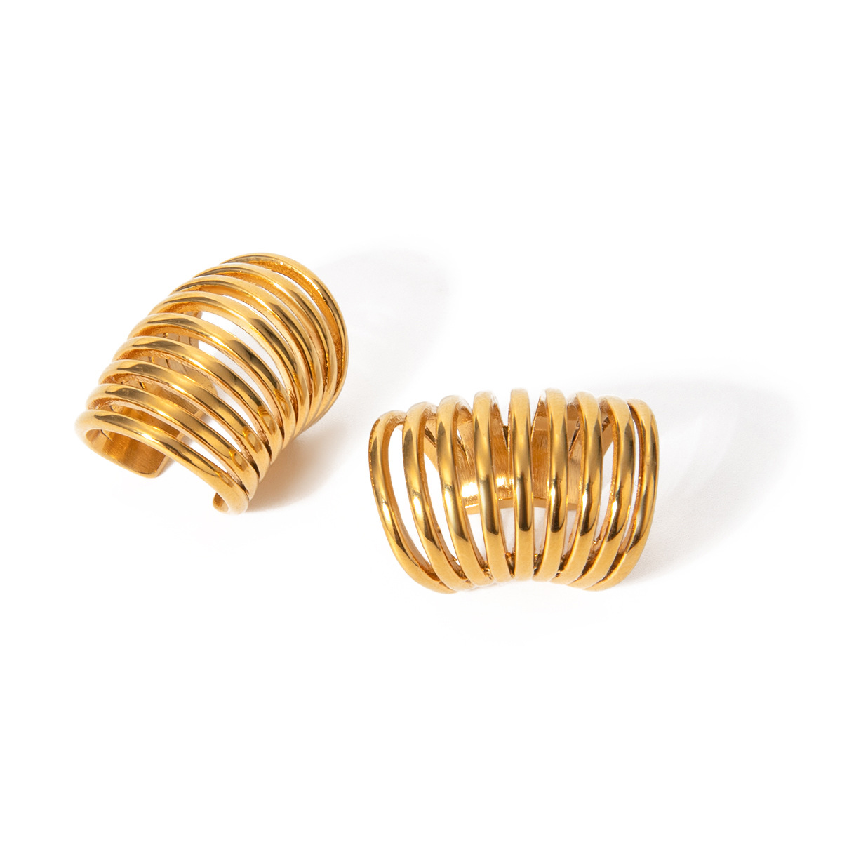 Europa y los Estados Unidos transfronterizos en la personalidad simple 18k oro de acero inoxidable resorte auriculares joyas de orejas al por mayor para mujeres