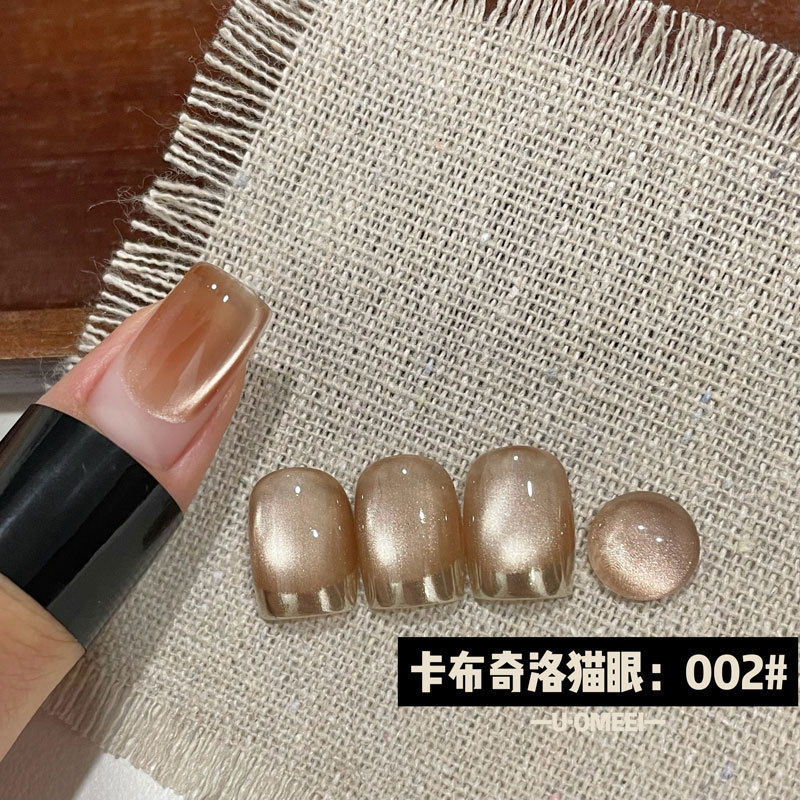 Venta caliente transfronteriza pegamento para ojos de gato rojo hielo arte de uñas celebridades de Internet caliente tienda de uñas de uso común pegamento de esmalte de uñas de ojo de gato de cristal popular