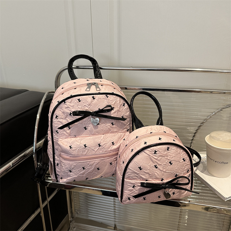 Mochila para mujer 2025 verano nuevo estilo súper fuego moda bowknot mochila portátil mochila escolar para estudiantes de gran capacidad