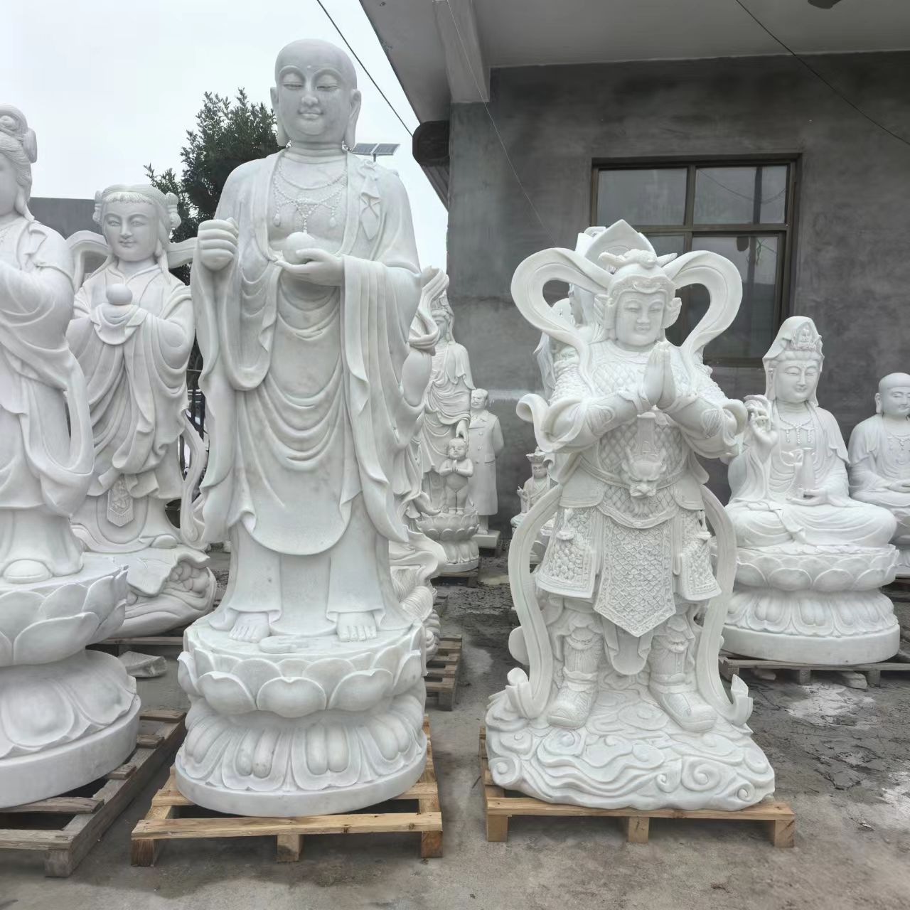 石雕汉白玉佛像阿弥陀佛三面滴水观音地藏王文殊菩萨定制户外摆件