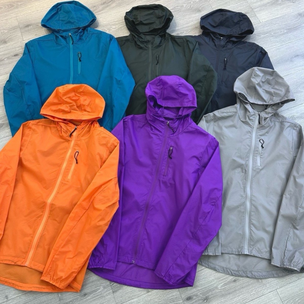 Ba # Affordable Alternative to Men's and Women's Classic Solid Color Quick-Dry Sun-Protective Breathable Hooded Zip-Up Windbreaker.