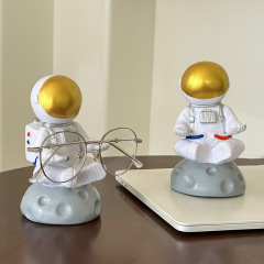 クリエイティブな宇宙飛行士メガネホルダー装飾品メガネホルダー装飾品メガネディスプレイ小道具ディスプレイスタンド装飾品