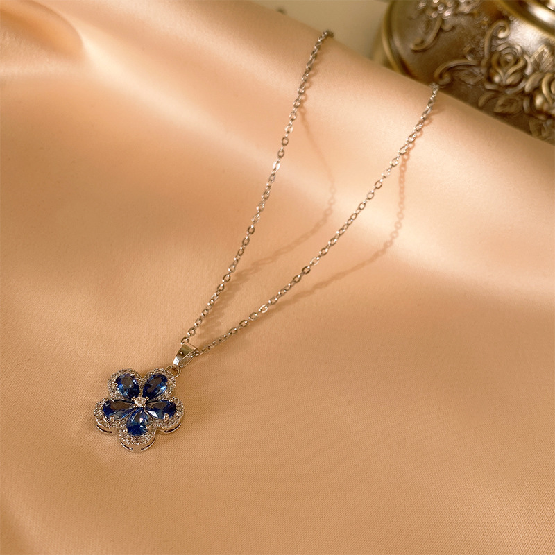 Aguja de plata azul aretes de flor de zircón estilo ligero de lujo estilo alto collar nuevo aretes al por mayor image 8