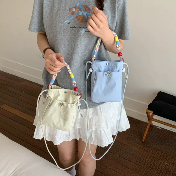 Spring and summer casual versatile nylon crossbody phone bag, lightweight small backpack for outings, simple and stylish coin and earphone bag
