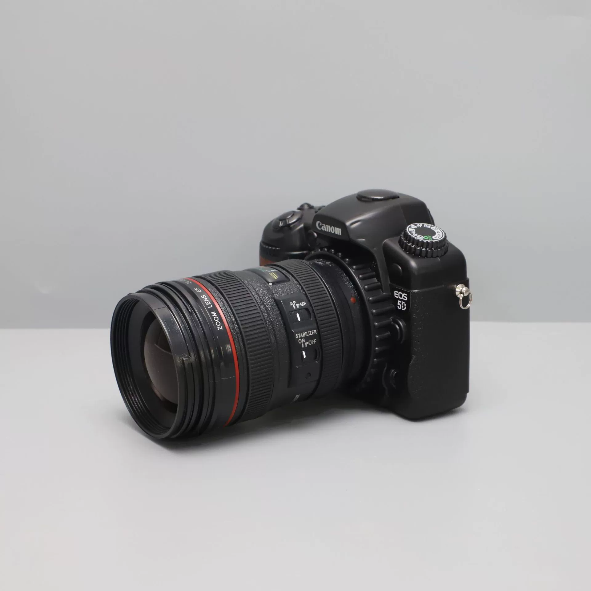 Modern and minimalistic realistic camera, model, minifigure, decorations, stand