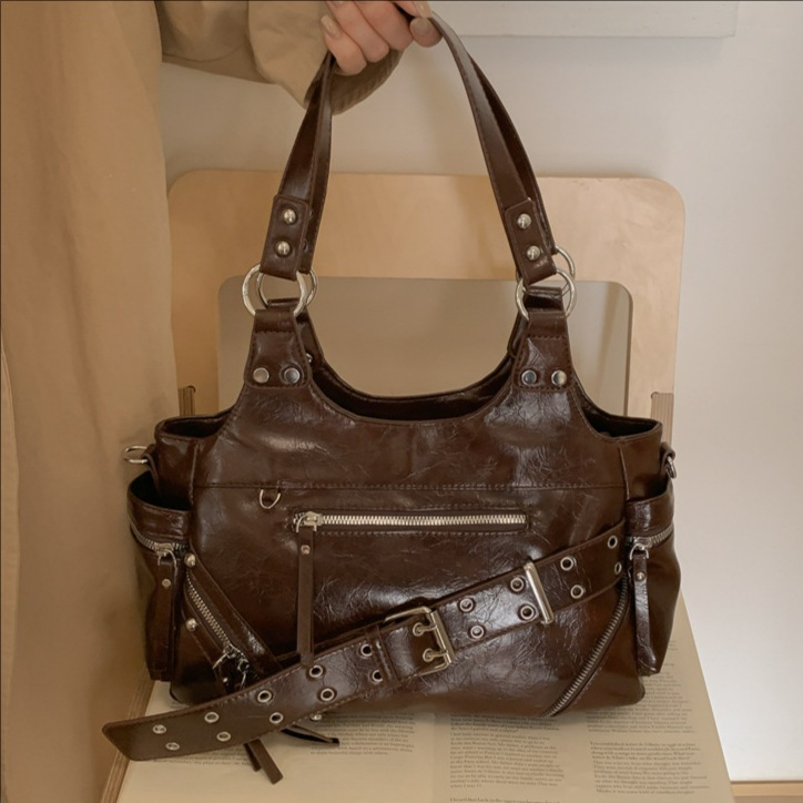 Bolsa de motocicleta de chicas calientes transfronterizas para mujeres 2025 nuevo retro cuero de cera de aceite de hombro bolso de brazo bolso de mano casual