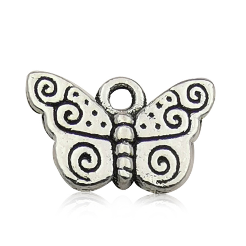 Venta transfronteriza de colgante de aleación de plata Xizanga con forma de mariposa, hecho a mano, para collar, pulsera, accesorio de joyería, venta al por mayor.