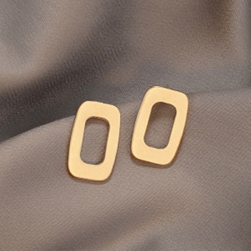 Pendientes geométricos metálicos europeos y americanos para mujer nuevo estilo frío pendientes de alta gama Pendientes de temperamento simple al por mayor en stock