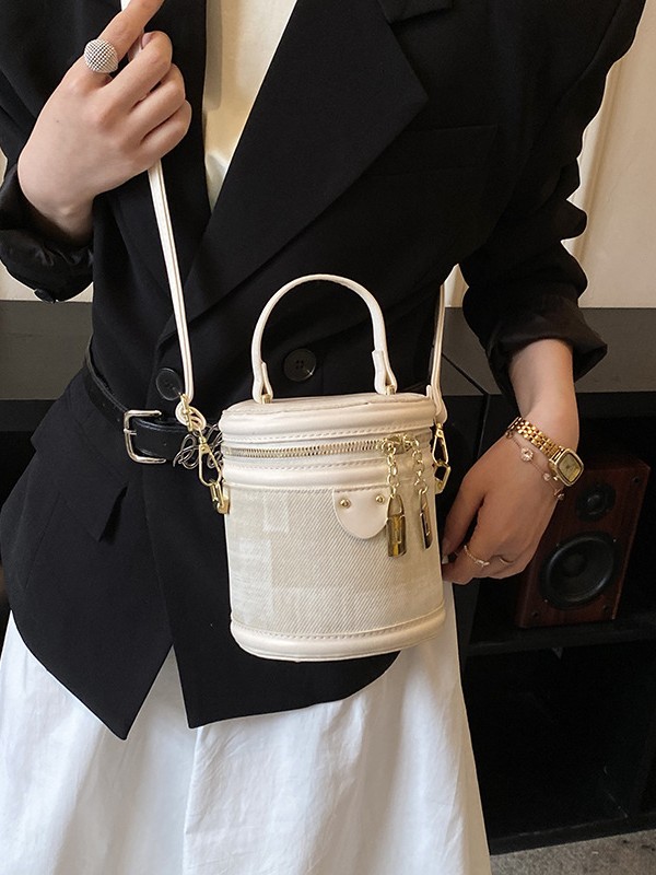 Bolsa de cilindro coreana de diseño popular de nicho 2026 nueva moda simple de hombro portátil bolso de cubo