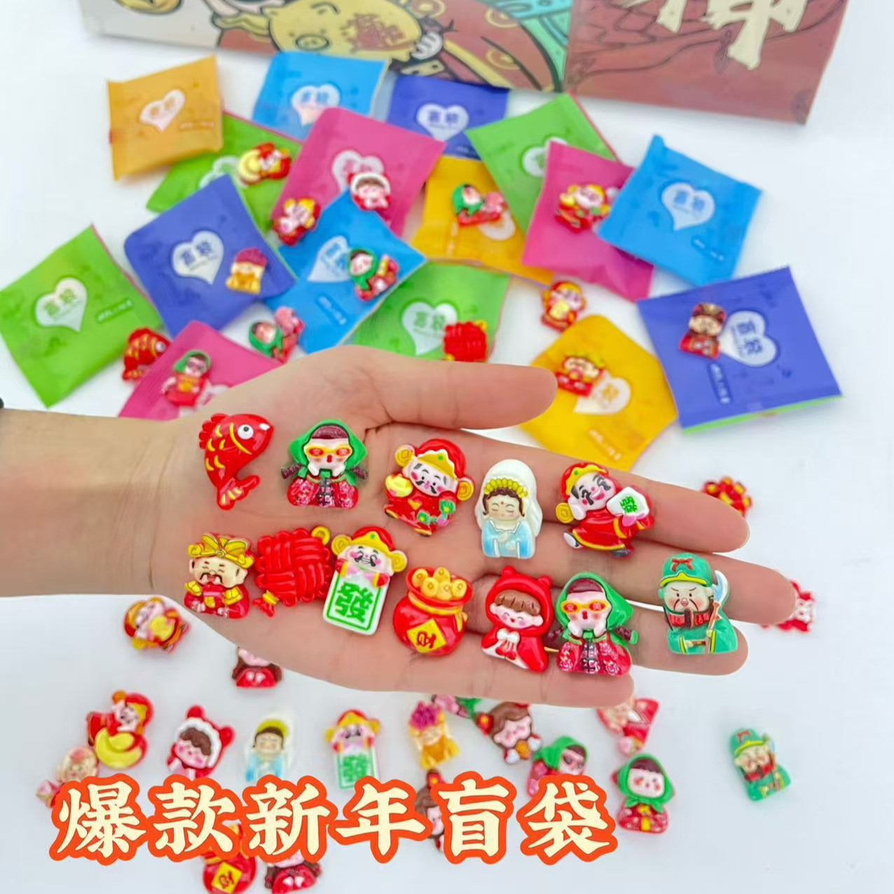 El Festival de primavera de año nuevo, el Dios de la riqueza, la resina DIY accesorios al por mayor DIY crema hecha a mano, accesorios para el cabello de la cuerda de la cabeza de la carcasa del teléfono móvil