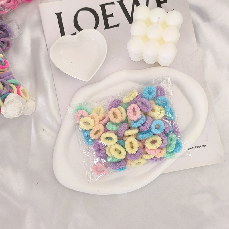 Solo al por mayor cuerda de pelo negro banda de pelo femenino estilo coreano alta elasticidad no duele el pelo banda de goma corbata alta Cola de Caballo accesorios para el cabello del bebé