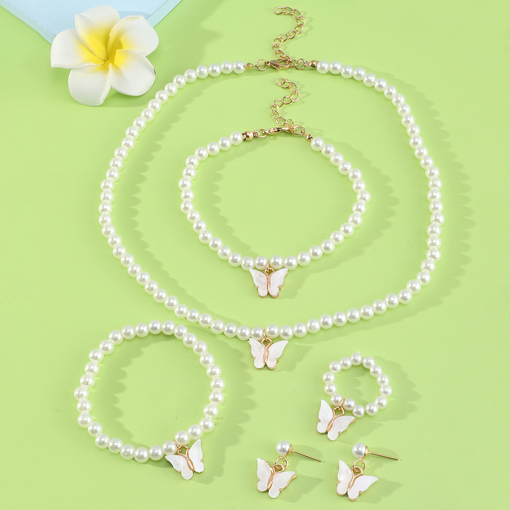 Children's Jewelry Korean Simple Style Butterfly Pearl Necklace Ring Bracelet Earring Set display picture 1