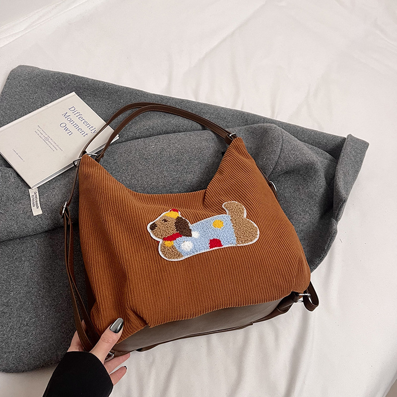 Mochila de hombro de moda exterior mochila de ocio nicho de diseño diario de viaje bolsa de cubo de moda mochila de mujer