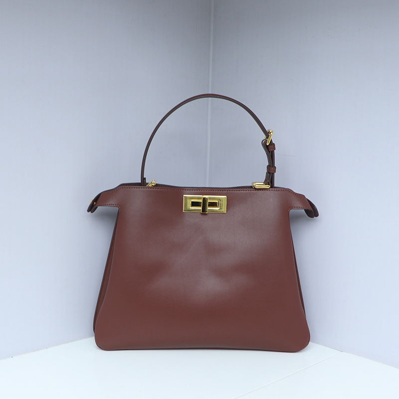 24 otoño e invierno nueva bolsa de bolso de mujer PB tamaño medio bolsa de gatito de cerradura de metal de lujo ligero bolsa de cuero bolsa axila de un solo hombro