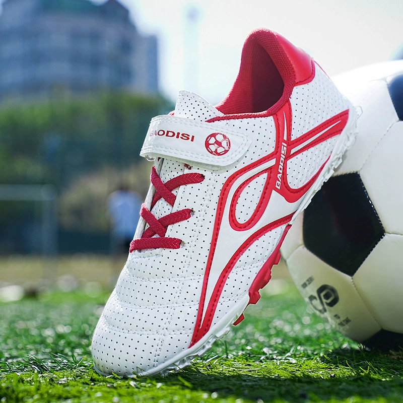 Футбольные бутсы с отверстием для вращающейся кнопки, детские футбольные бутсы с длинными шипами, обувь для мальчиков и девочек с сломанными шипами, спортивная обувь для соревнований и тренировок для учащихся начальной школы
